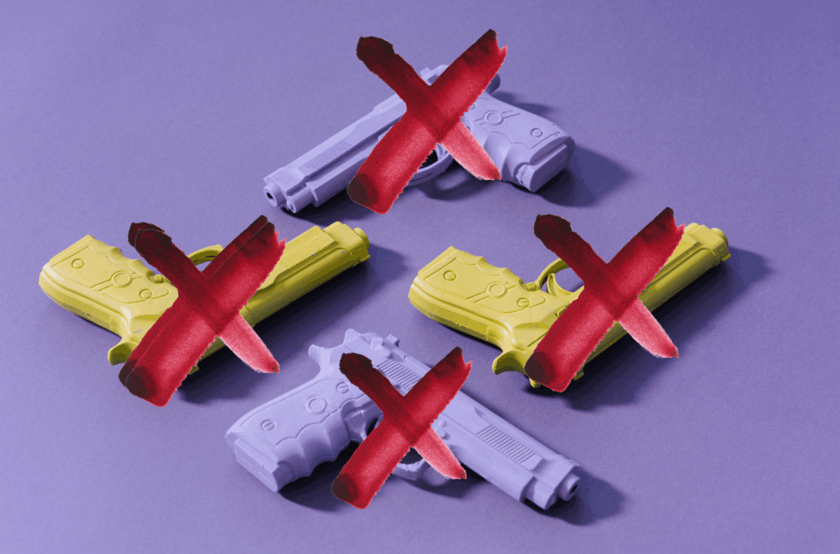 Four colorful handguns pictured on a light purple background. Each handgun is large dark red "x" corresponding to increase in Delaware gun control.