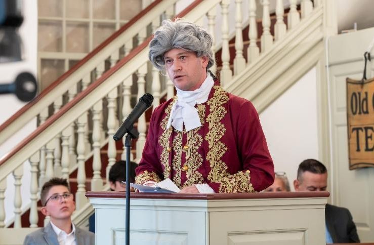 State Representative Jeff Spiegelman in period dress delivering correspondence from the 2nd Continental Congress at the 250th Anniversary Independence event.
